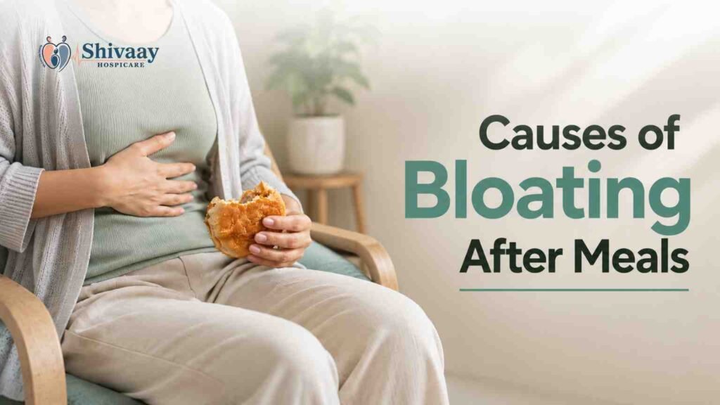 Woman experiencing abdominal discomfort while eating to illustrate causes of bloating after meals